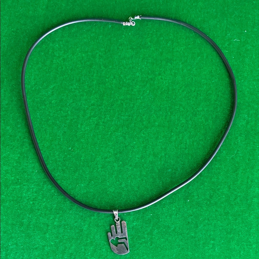 Vintage Taxco Mexico 950 Sterling Silver hand pendant with black cord necklace